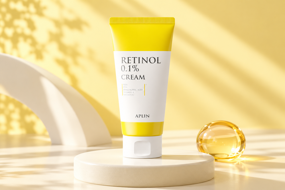 APLIN Retinol 0.1% Cream in a warm yellow studio setting