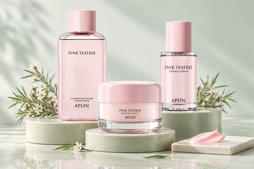 APLIN Pink Tea Tree toner, serum and cream in a pale sage studio setting